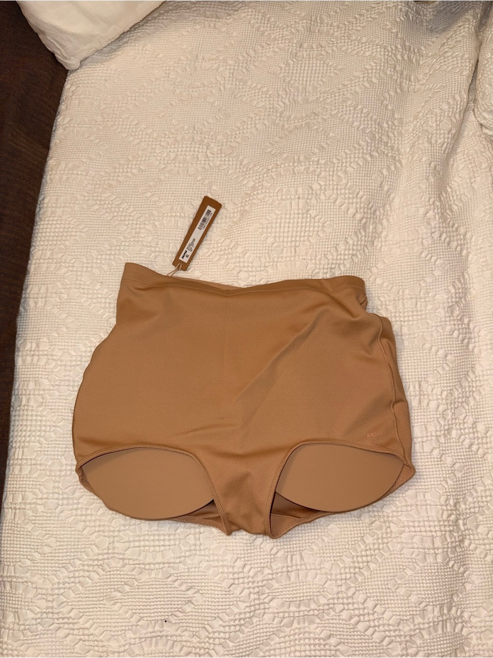 SKIMS High-Waist Butt Enhancing Shapewear Briefs in Nude Tan